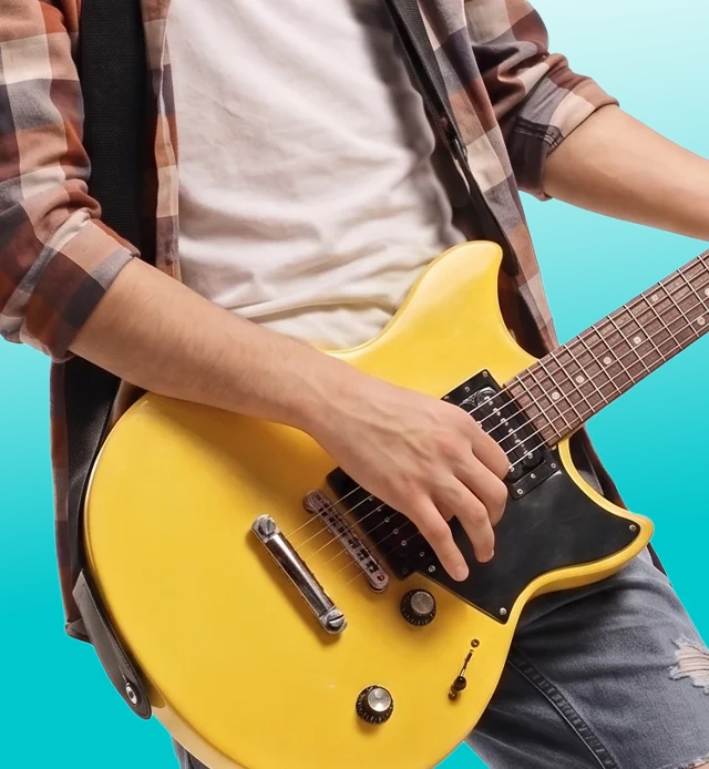 Guitarra eléctrica en una clase de la escuela de música Music Planet, Carapungo